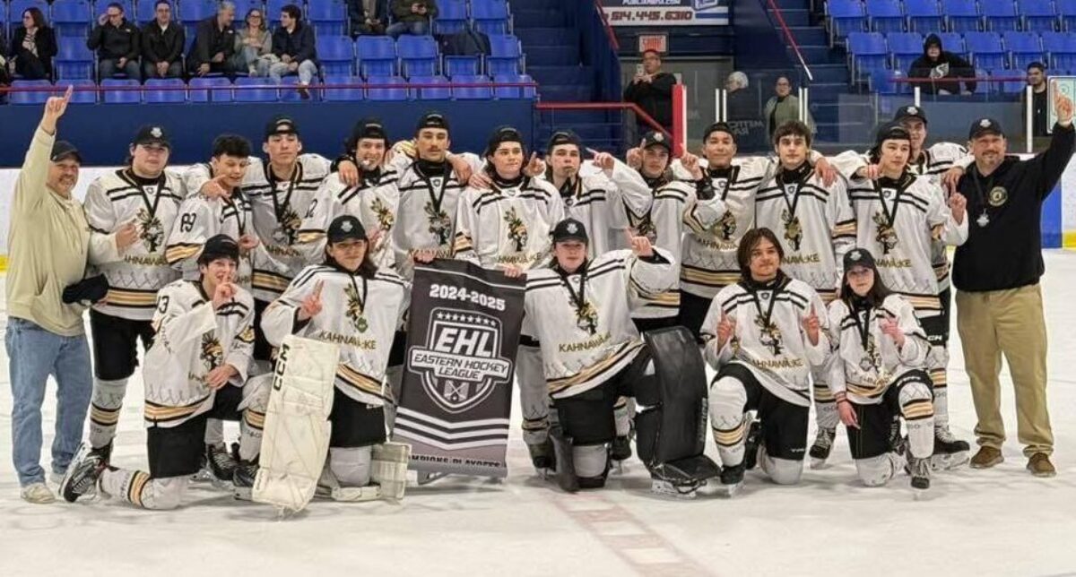 The U18B Mohawks posing with medals after their win.