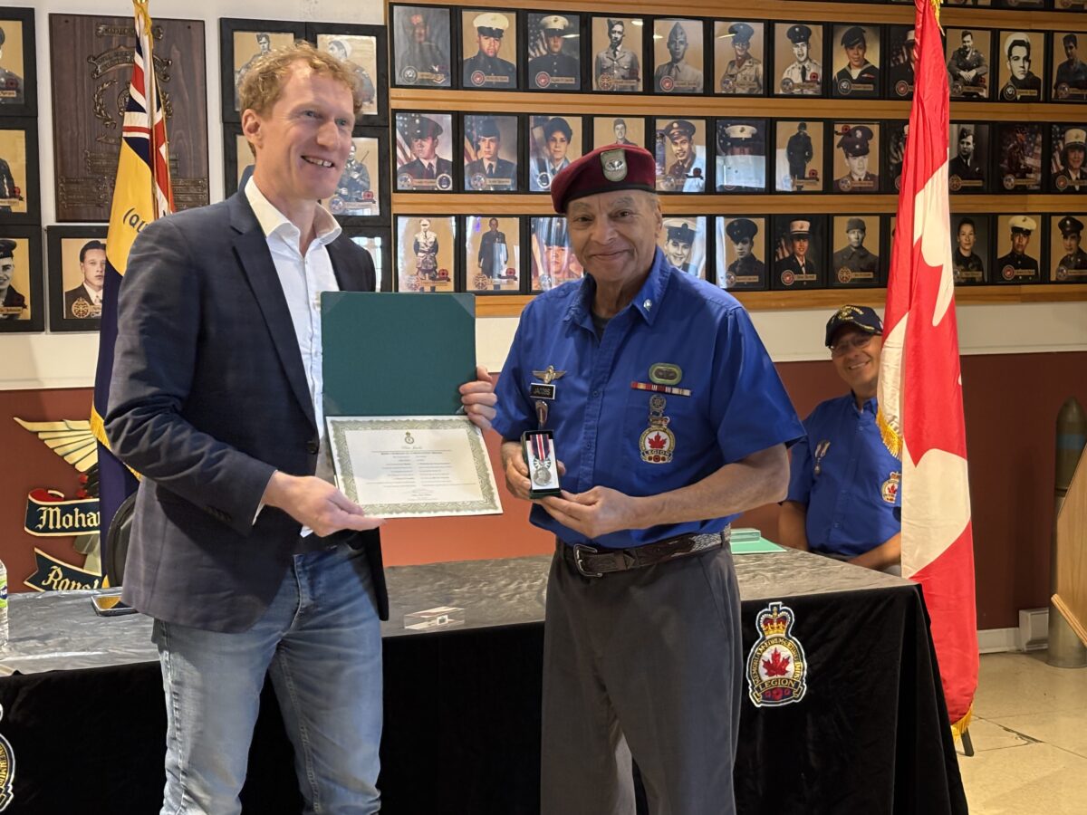 Peter “Pitt” Jacobs, right, alongside member of Parliament Marc Miller. Jacobs was among six veterans in Kahnawake given the King Charles III’s Coronation Medal at a ceremony on Wednesday.