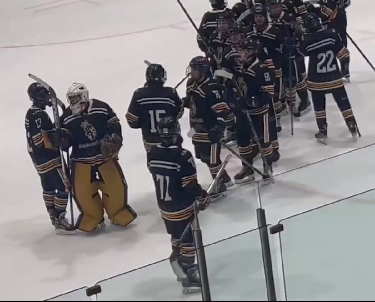 U21 Mohawks players celebrating on the ice after a victory