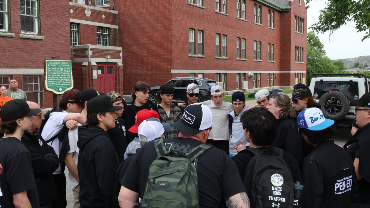 Players from Team Eastern Door and the North visiting the site of the Kamloops Residential school.