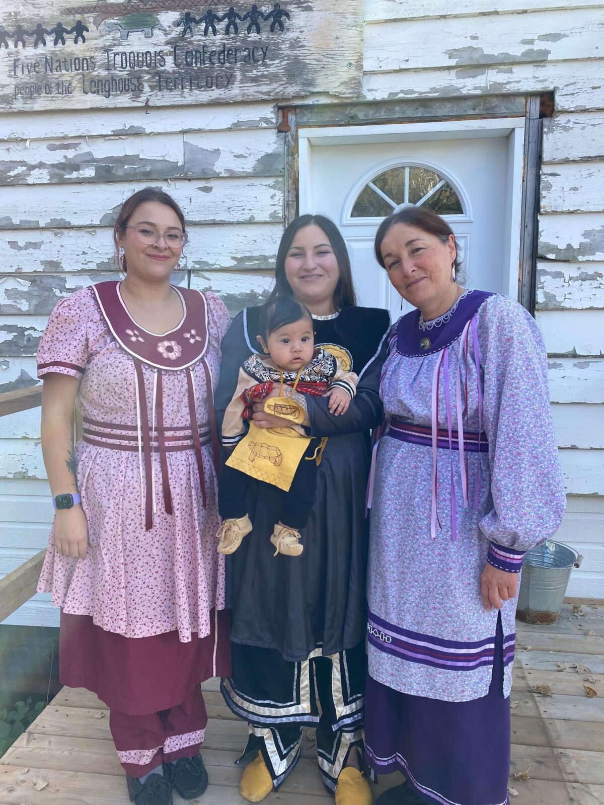 Photo of Otsitsaónwe Gaspe, right, her daughters Kahentanoron Beaver, left, and Karihohetstha Cupples, middle.