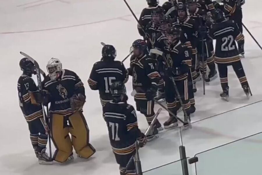 U21 Mohawks players celebrating on the ice after a victory