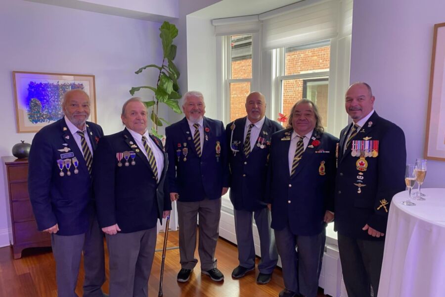 Kahnawake veterans from the Royal Canadian Legion Mohawk Branch 219 (from left to right) Peter “Pitt” Jacobs, Louie Stacey, Gerald Marquis, Legion president Ray Deer, Eric Bush, and Tracy Cross posing for a group photo.