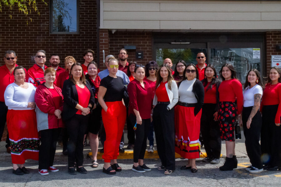 Council chiefs and employees of the Mohawk Council of Kahnawake posed for a picture wearing red clothing or accessories on Monday to mark Red Dress.