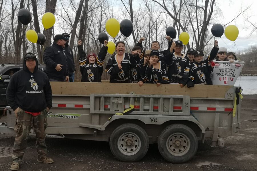 The U11B Mohawks hockey during a parade to celebrate the great season