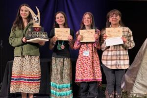 From left to right: Kanien’kwentha McComber, Kahnawiiostha Whyte-Turner, Willow Jackson, and Kaylani Delormier stand with their awards.
