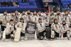 The U18B Mohawks posing with medals after their win.