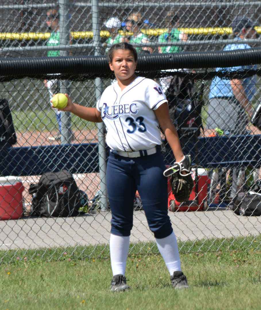 Kahnawake's own Raven Horn warms up betwwen innings before her team the Quebec Rebelles beat the Alberta's Lloydminster Liners 6-1 in a fastpitch softball game at parc Marcel-Martin last Wednesday August 17th. (Kacim Steets 2016)