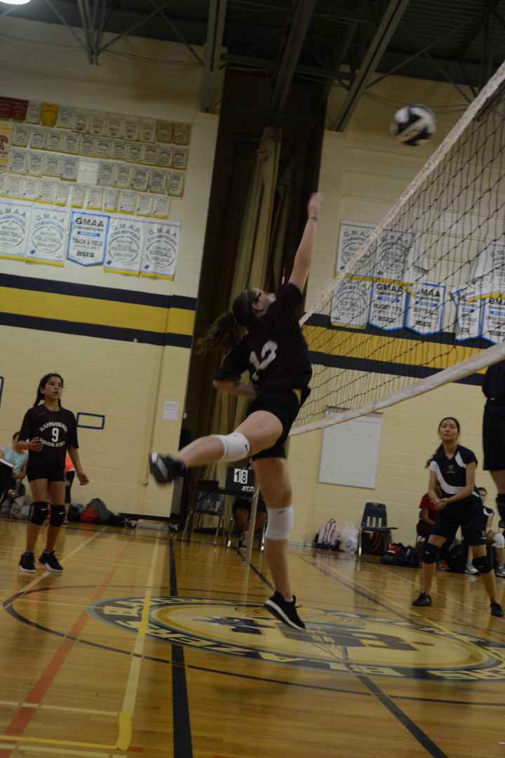 Iawenhontsaieshon Peterson-McGregor puts the final smack on a rally against the Study in the third of three matches Survival School played to open the season. - Daniel J. Rowe