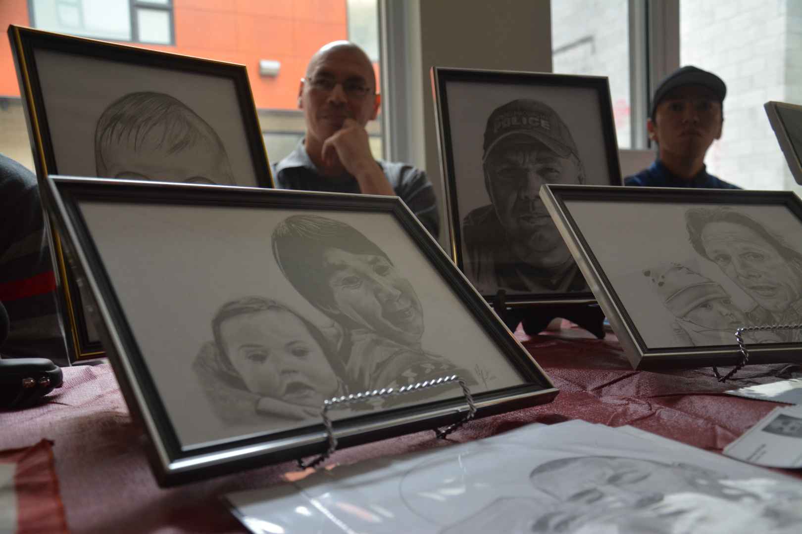 Marcus A. Frost has been perfecting his drawing techniques in portraiture of family and clients for the last three decades. (Jessica Deer, The Eastern Door) Rick Quavavauq, who is a part of the Buffalo Hat singers and drum group, had a number of stone carvings on display as a part of the exhibition. (Jessica Deer, The Eastern Door)