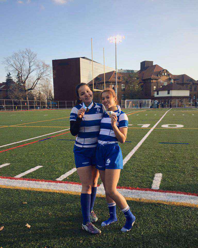 Courtesy Journey Jacobs Cameryn Meloche and Journey Jacobs were forced to watch in anxiety from the sidelines for the second half, while their Dawson Blues rugby squad stole the championship banner from John Abbott.