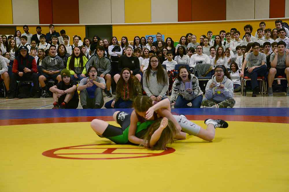 The pin seemed like a foregone conclusion for both Jordyn and Winter Goodleaf, who wrestled in honour of their father and former wrestler Winston, who passed away far too soon this week. (Daniel J. Rowe, The Eastern Door)