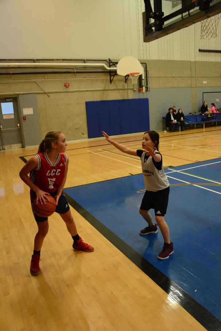Mya McGregor (right) and her KSS girls played LCC as hard as they could Wednesday, but were stifled by an unrelenting defence from the NDG side. (Daniel J. Rowe, The Eastern Door)